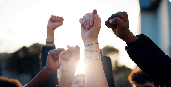 An image of unity with a fist raised high.